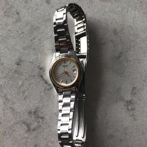 Carvelle Quartz Silver with Gold Woman’s Watch
